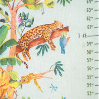 Children's growth chart with a leopard and bird design .