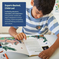 Child reading a book with nature-themed illustrations, surrounded by educational materials.