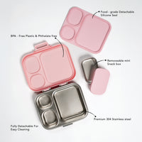 Pink and silver lunch box with detachable snack box on a white background