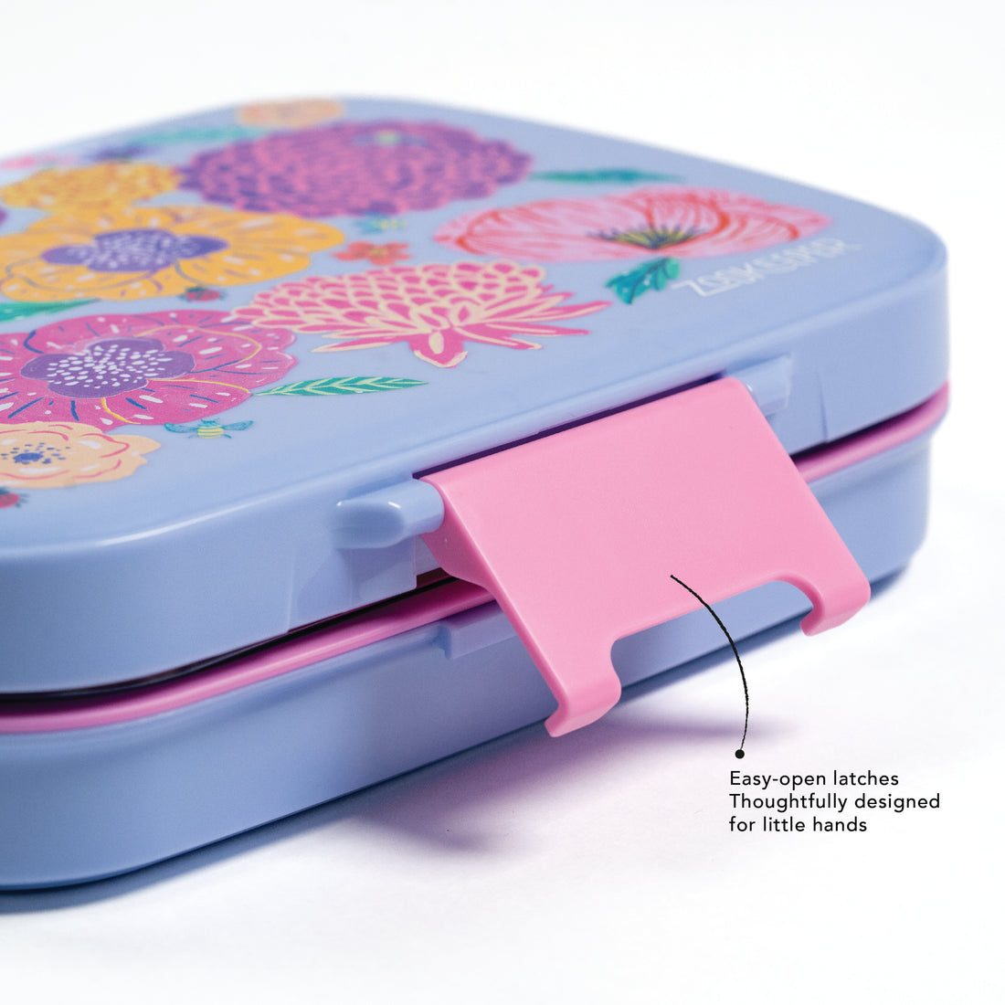 Colorful floral-patterned lunch box with a pink latch