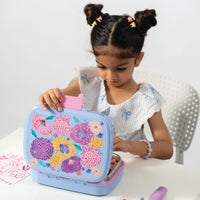 Young girl with floral design lunch box 
